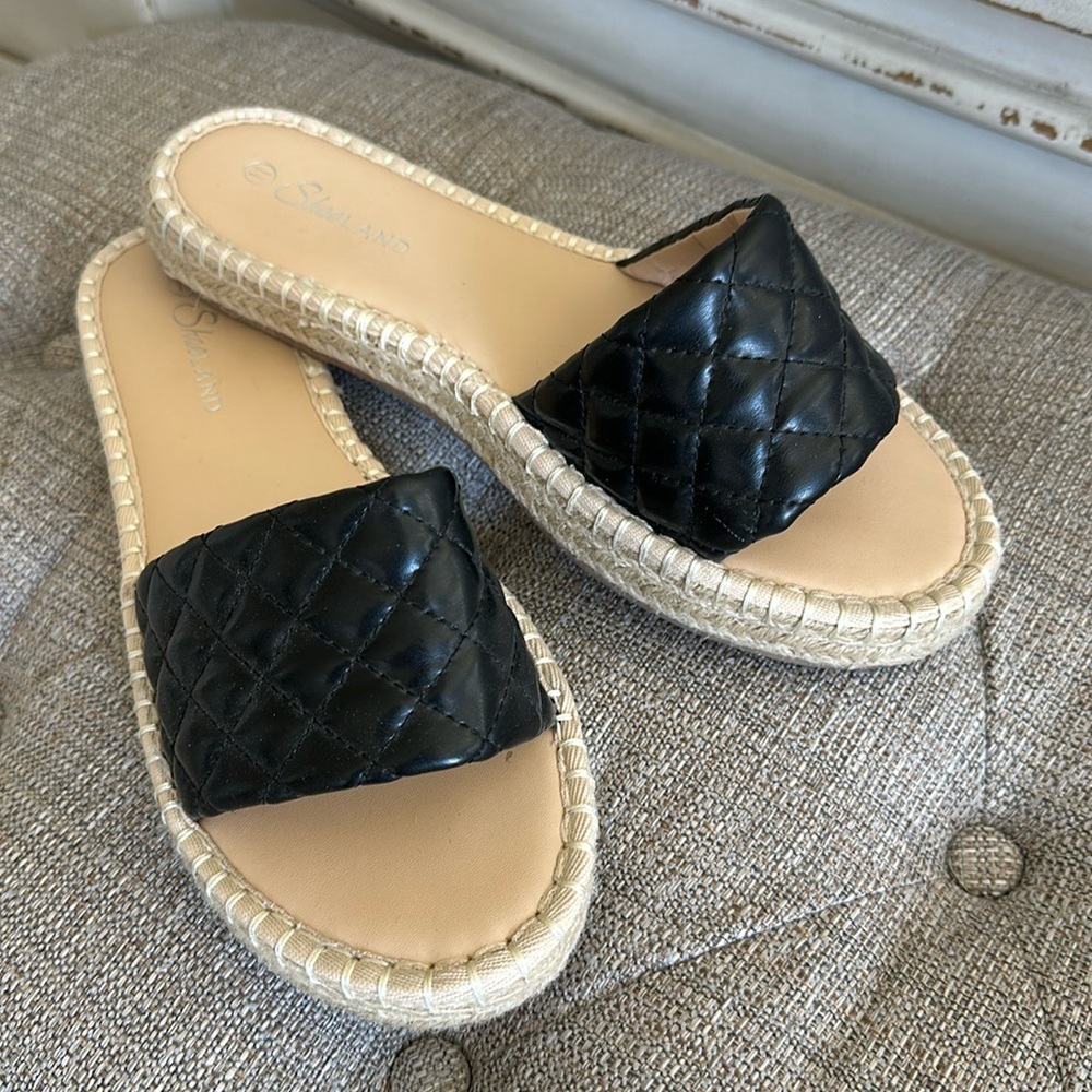 Women’s black quilted slides. Size 11M. Excellent condition.